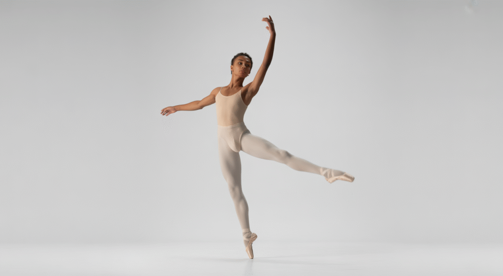 Young ballet dancer practicing gracefully in a professional studio, representing youth ballet programs in Toronto.