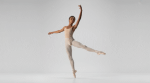 Young ballet dancer practicing gracefully in a professional studio, representing youth ballet programs in Toronto.